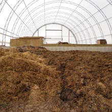 Composting Inside a Hercules Truss Arch Building - Growers Supply